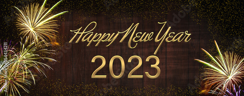 Fireworks, golden sylvester-fireworks with golden particles on black-brown wooden background and text: happy new year 2023