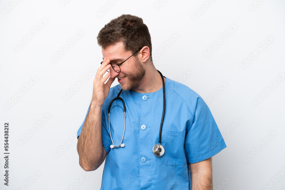Young surgeon doctor caucasian man isolated on white background laughing Young surgeon doctor caucasian man isolated on white background laughing
