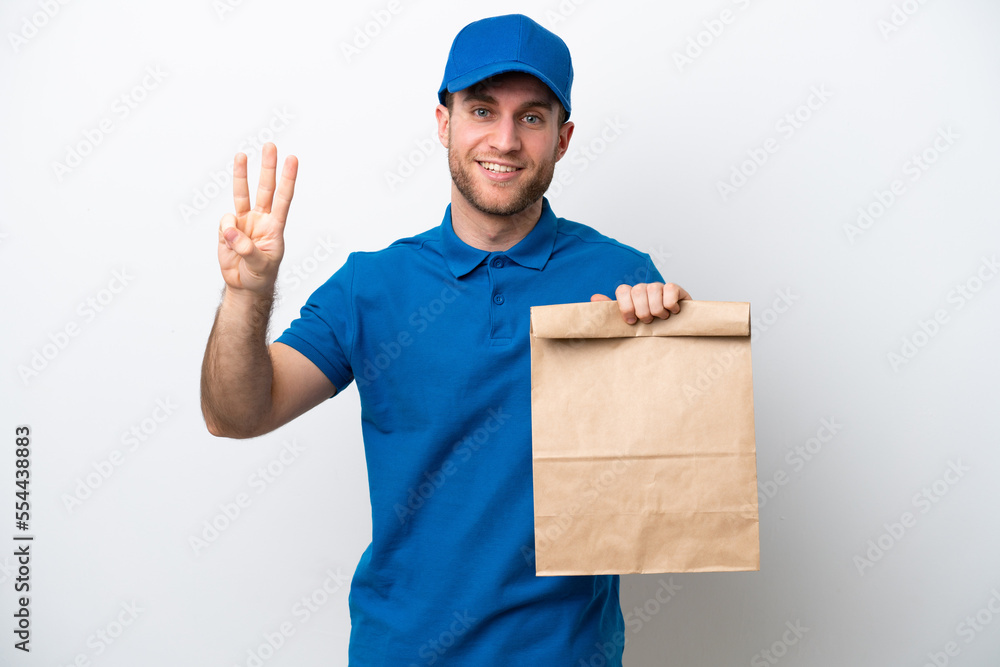 Delivery caucasian man isolated on white background happy and counting three with fingers Delivery caucasian man isolated on white background happy and counting three with fingers