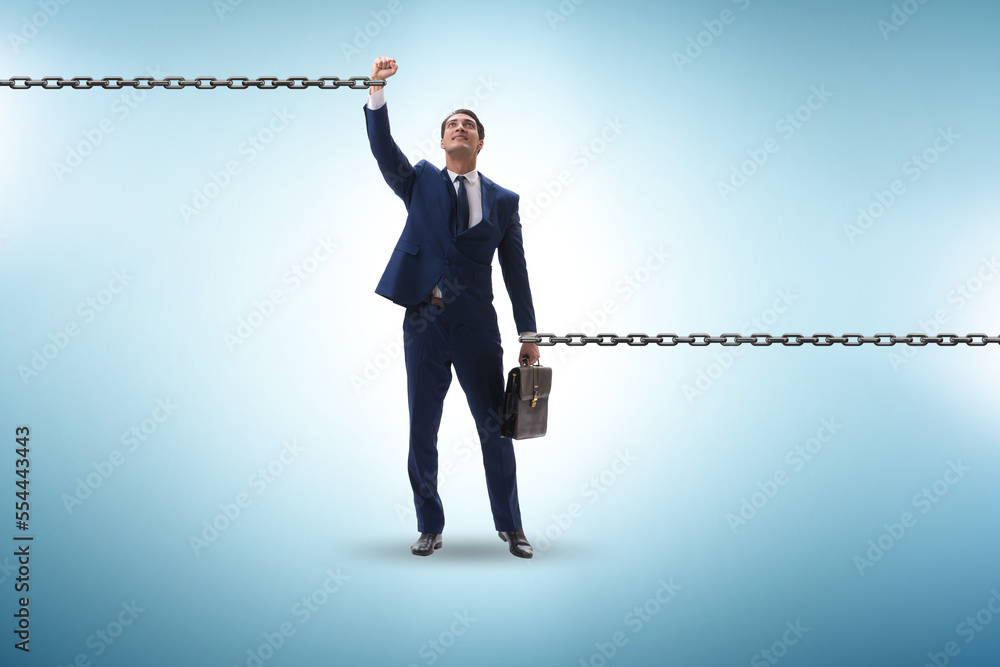 Fototapeta premium Chained businessman in workaholic concept