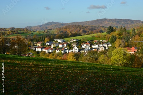 Herbstlicher Aspekt des Lindenfelser Ortsteils Kolmbach im westlichen Odenwald mit Blick nach Südwesten Richtung Melibokus und Oberrheinebene photo