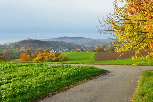 Herbstlicher Aspekt des westlichen Odenwaldes vom Lindenfelser Ortsteils Kolmbach über den Lautertaler Ortsteil Gadernheim nach Südwesten Richtung Melibokus und die Oberrheinebene photo