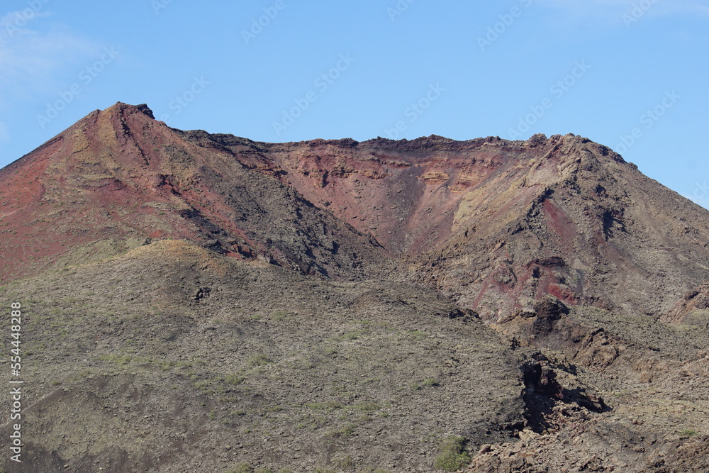 Fototapeta premium Different shapes of volcanic lava which solidified on Lanzarote Island 200 years ago, rocks, lava, photographed in November 2022, lava chimney, lava tunnel
