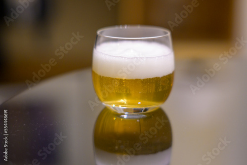 Close-up and selective focus shot of a beer glass