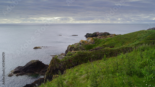 rocky coastline, about one kilometer east of Cruden Bay photo