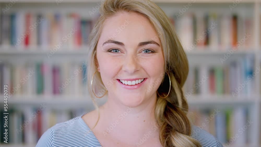 Face, woman and smile while happy in a library room with books on bookshelf for education, learning and positive mindset. Portrait of english London student with pride for scholarship and freedom Face, woman and smile while happy in a library room with books on bookshelf for education, learning and positive mindset. Portrait of english London student with pride for scholarship and freedom
