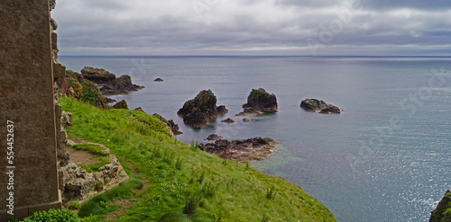 rocky coastline, about one kilometer east of Cruden Bay photo