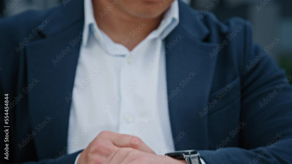 Cropped view closeup male hand with wristwatch clock Asian middle-aged businessman manager man male boss company CEO entrepreneur employer check time lateness waiting for meeting taxi in city outdoors Cropped view closeup male hand with wristwatch clock Asian middle-aged businessman manager man male boss company CEO entrepreneur employer check time lateness waiting for meeting taxi in city outdoors
