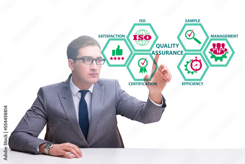 Businessman in quality assurance concept Businessman in quality assurance concept
