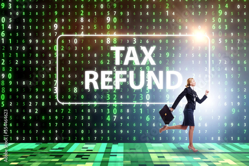 Obraz na płótnie Businesswoman in tax refund concept