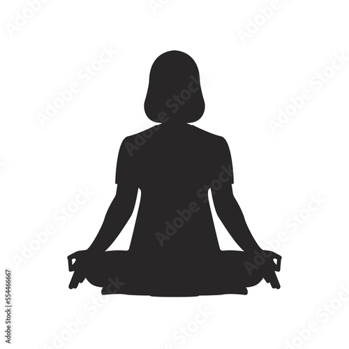 Silhouette of a woman sitting in the lotus position
