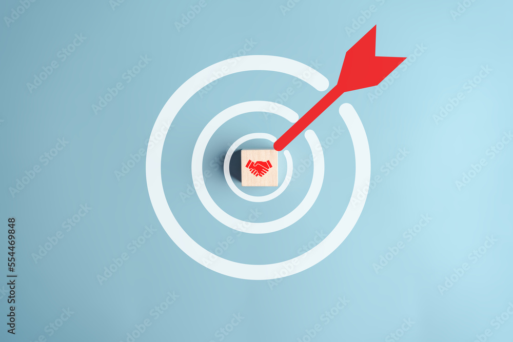 target and handshake icon which for planning development leadership and customer target group teamwork and partnership, dealer concept. target and handshake icon which for planning development leadership and customer target group teamwork and partnership, dealer concept.