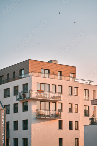New modern architectural building house. The exterior of a Residental Building on sky background.