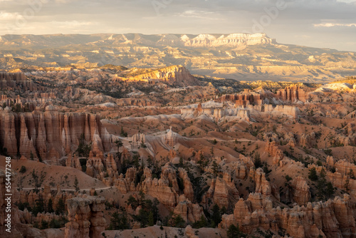 Late Afternoon Light Highlights the Mountains Behind Bryce Canyon