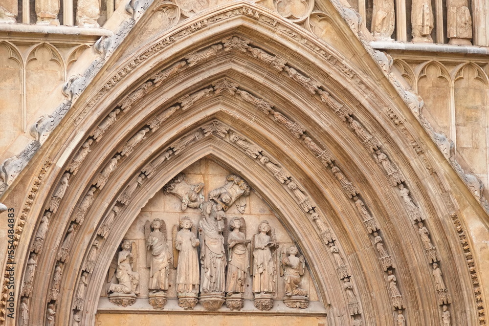 Spectacular gothic facade of the cathedral of Valencia with sculptures