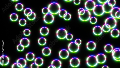different colored circles on a black background