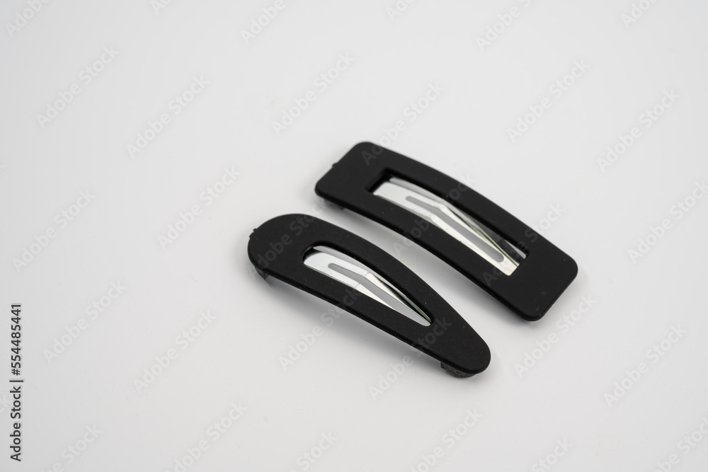 set of two black hair grips slides styles isolated on a white background - obrazy, fototapety, plakaty 