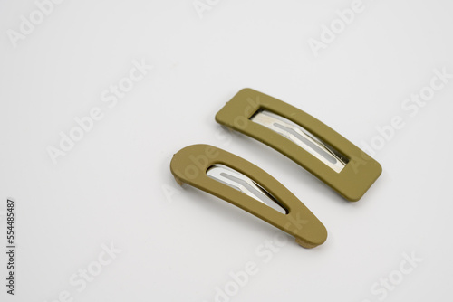 set of two olive hair grips slides styles isolated on a white background