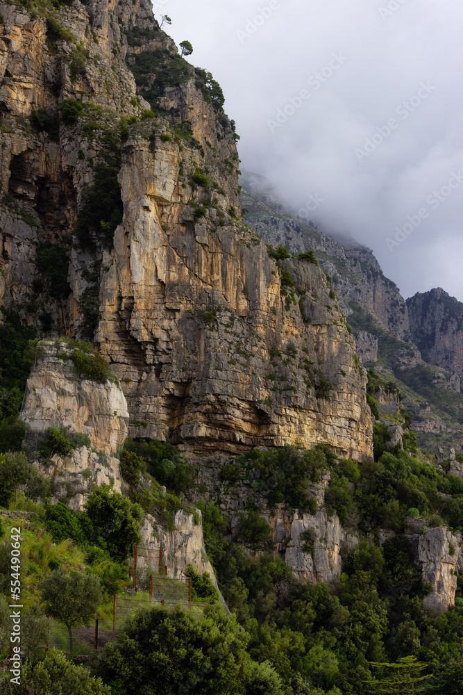 Rocky Cliffs and Mountain Landscape by the Tyrrhenian Sea. Amalfi Coast, Italy. Nature Background. Rocky Cliffs and Mountain Landscape by the Tyrrhenian Sea. Amalfi Coast, Italy. Nature Background.