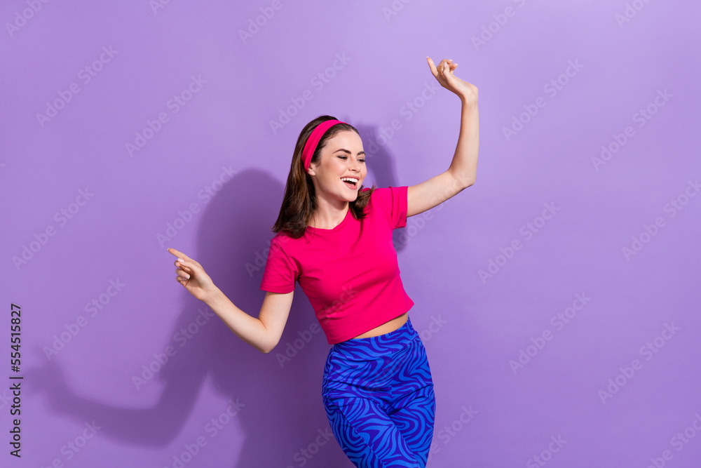 Naklejka premium Photo of carefree positive pretty girl have fun dancing chilling free time isolated on violet color background