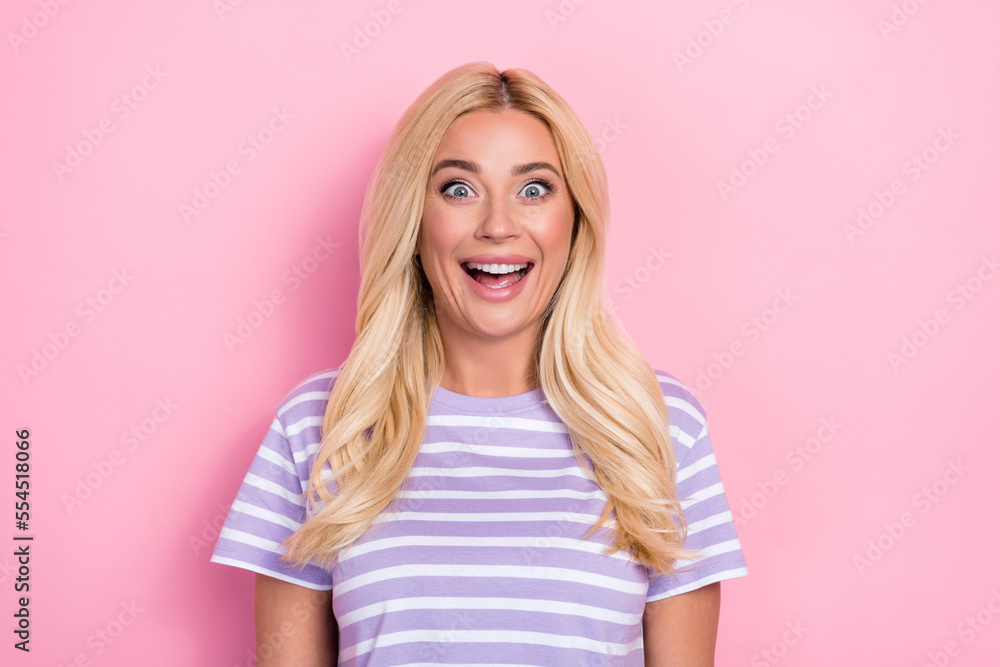 Photo portrait of young overjoyed lady wear striped pink t-shirt open mouth unexpected reaction big season sale isolated on pink color background Photo portrait of young overjoyed lady wear striped pink t-shirt open mouth unexpected reaction big season sale isolated on pink color background