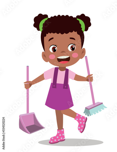 cute little boy cleaning with broom and shovel