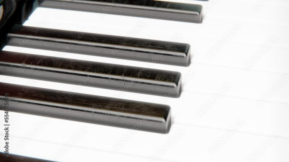 Piano keys, close-up seamless loop. 4K animation. Piano keys, close-up seamless loop. 4K animation.