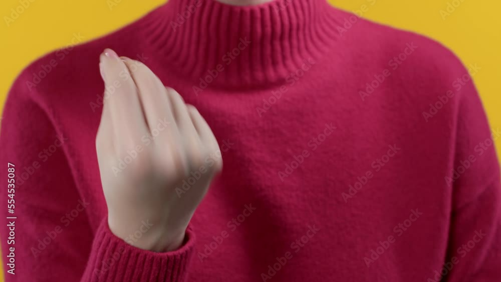 Woman making delicious, perfect italian hand gesture. Girl admires taste of food on red yellow background. Bellissimo concept. Woman making delicious, perfect italian hand gesture. Girl admires taste of food on red yellow background. Bellissimo concept.
