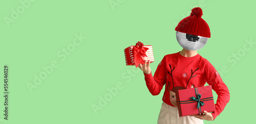 Woman with Christmas gifts ...