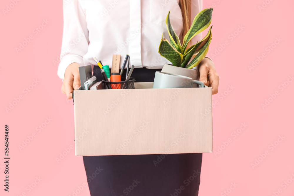 Ταπετσαρία Fired young woman holding box with her stuff on pink background, closeup