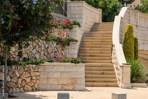Fototapeta Naklejka Na Ścianę i Meble -  Marble stairs in beautiful park on sunny day