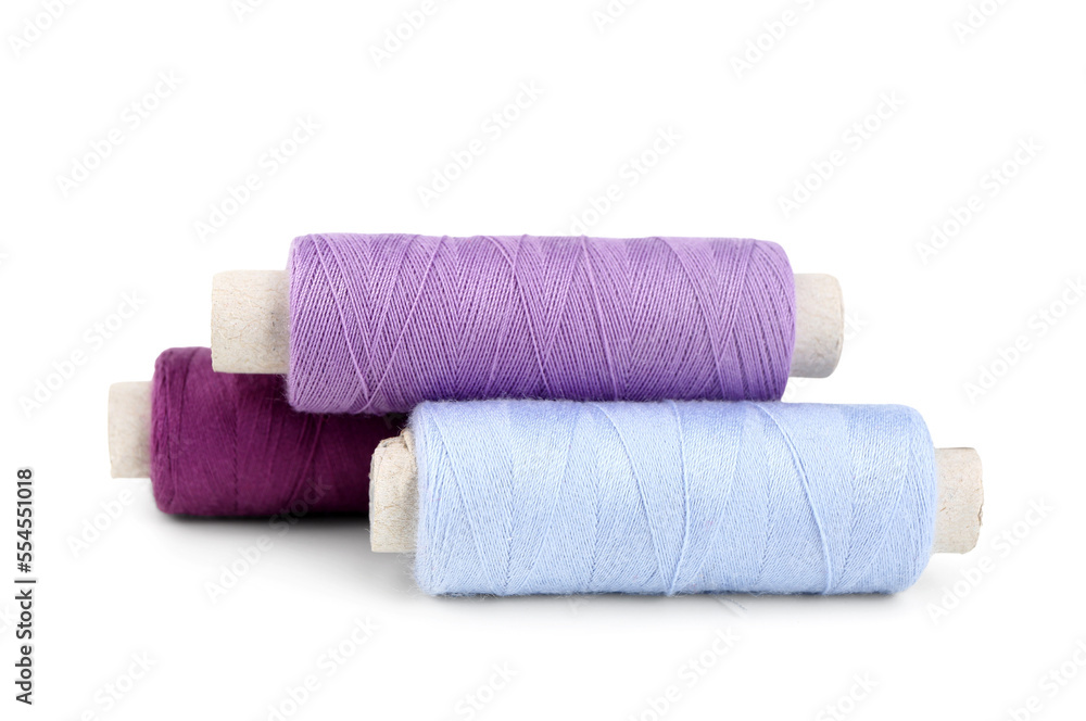 Colorful thread spools isolated on white background Colorful thread spools isolated on white background