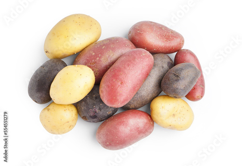 Heap of different raw potatoes isolated on white background