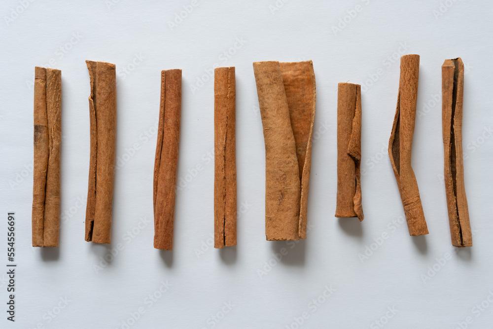 cinnamon sticks isolated on paper cinnamon sticks isolated on paper
