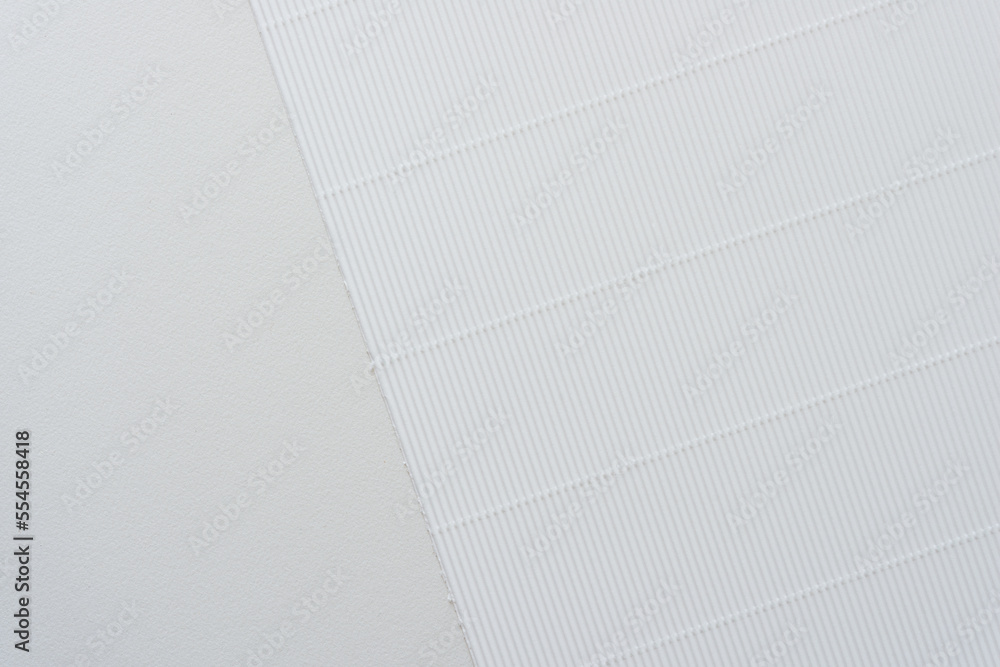 white corrugated paper on blank paper white corrugated paper on blank paper