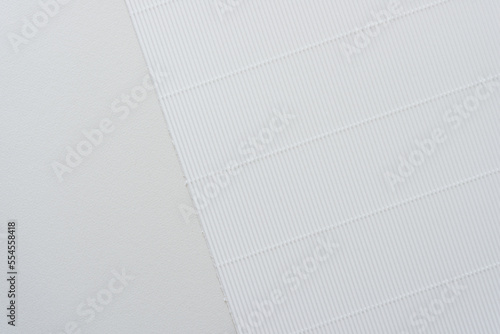 white corrugated paper on blank paper