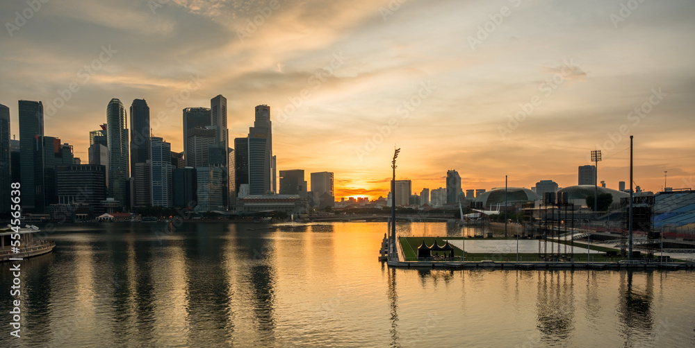 Landscape view of Singapore business district and city at twilight. Singapore cityscape at dusk building around Marina bay.