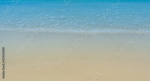 Abstract sand of beach and soft ocean wave background
