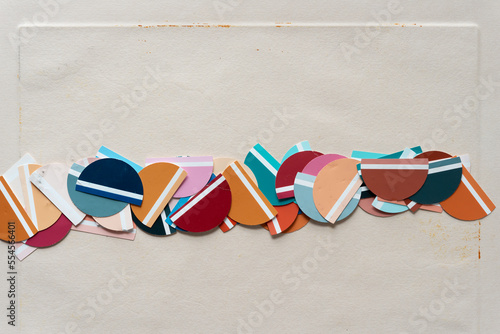 colorful semi circle shapes on old art paper with texture