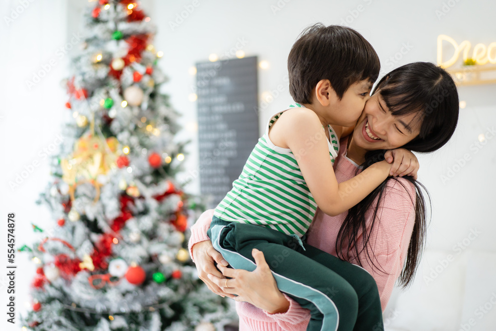 Happy little boy playing with his mother or sister. Happy little boy playing with his mother or sister.