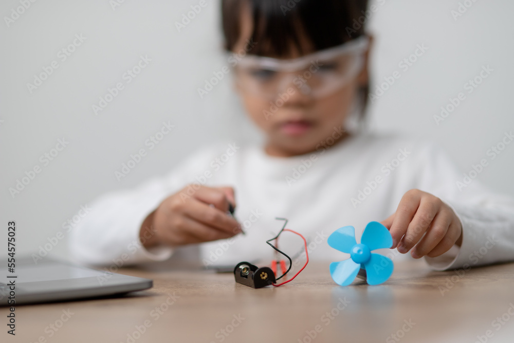 asia-students-learn-at-home-in-coding-robot-cars-and-electronic-board