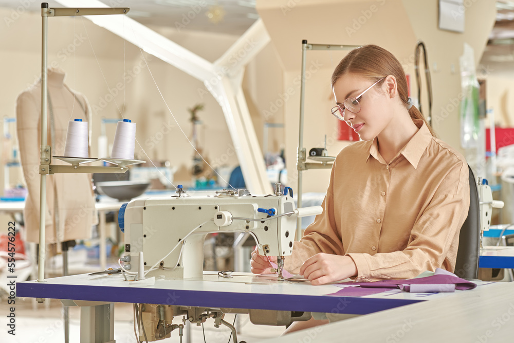 seamstress sews clothes seamstress sews clothes
