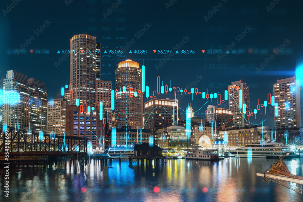 Obraz premium City view panorama of Boston Harbor and Seaport Blvd at night time, Massachusetts. Financial downtown. Glowing FOREX graph hologram. The concept of international trading and fundamental analysis