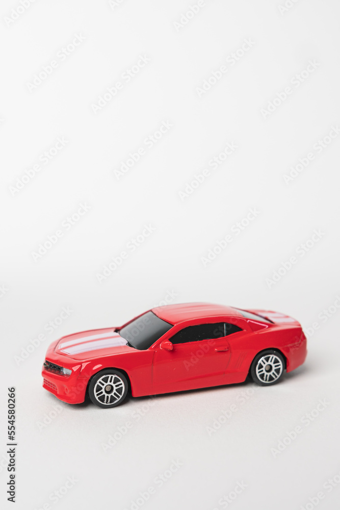 Red Toy car isolated on white background. modern red toy car