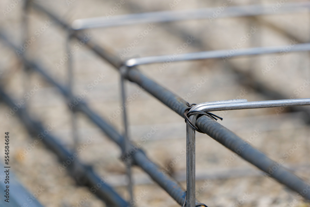 steel reinforcement on a concrete background. close view. steel reinforcement on a concrete background. close view.