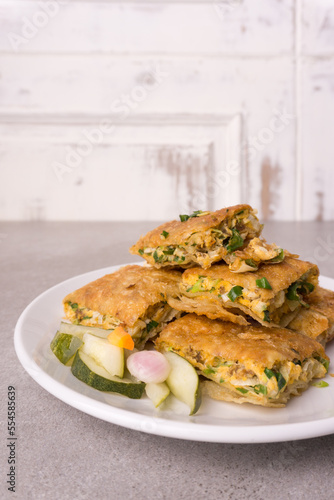 Martabak eggs, Martabak asin or Murtabak, is a popular street food in Indonesia, Asia and the Middle East. is a savory pan-fried pastry stuffed with egg, meat and spices