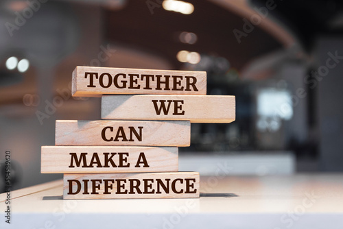 Wooden blocks with words 'Together We Can Make A Difference'.
