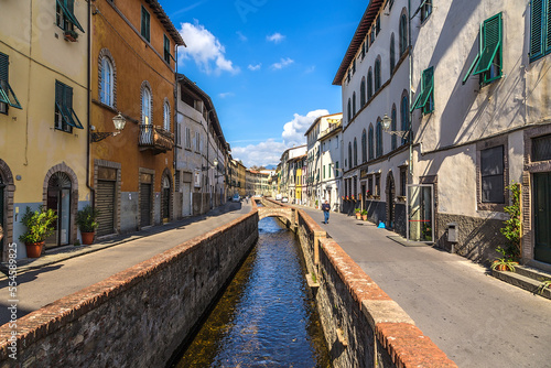 Lucca, Italy. Picturesque river channel with bridges in a medieval town
