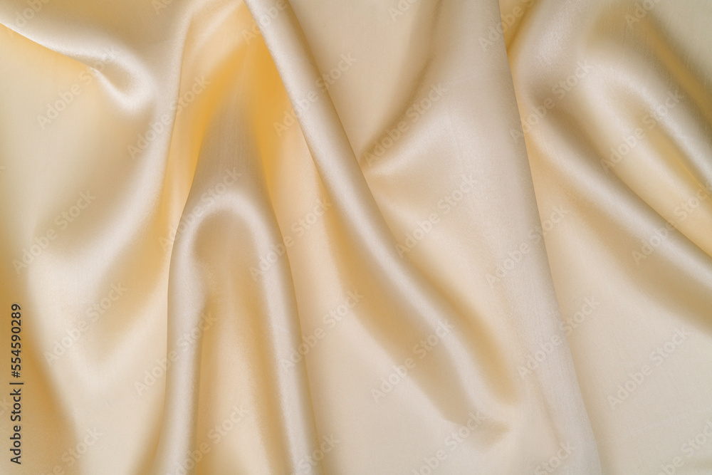 Close up of beige silk background Close up of beige silk background