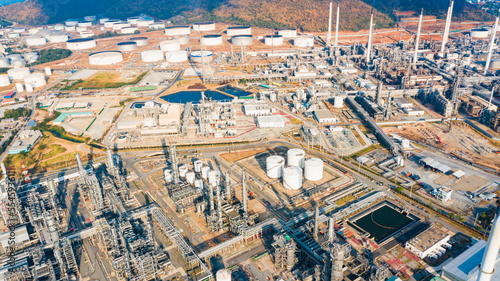 Aerial top view of Tank oil refinery plant and petrochemical plant with tower column of Petrochemistry industry in site construction and petrochemical plant